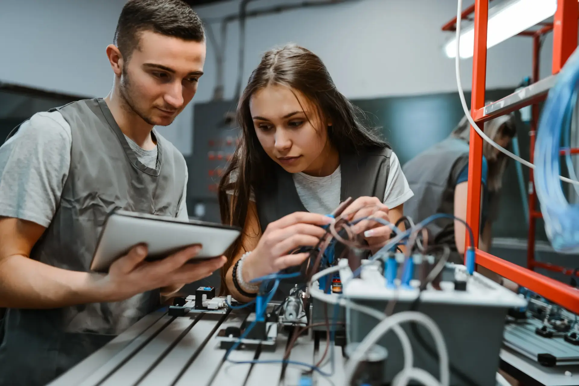 Industry professionals using electronic equipment